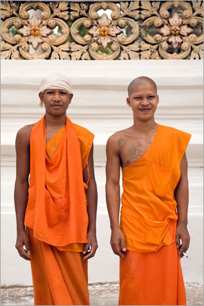 Two Monks With Cigarette